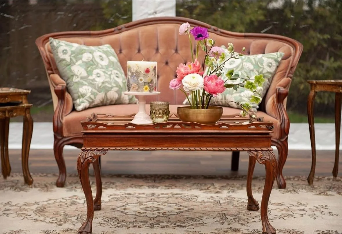 Love the pops of color from this floral arrangement.  We always recommend adding florals in some way to the lounge!

Design + Delivery: @aboveallevents 
Venue: Private Home
Caterer: @farmtotablebyfilomena 
Tent: @elitepbstentsevents 
Florals: @jennyw