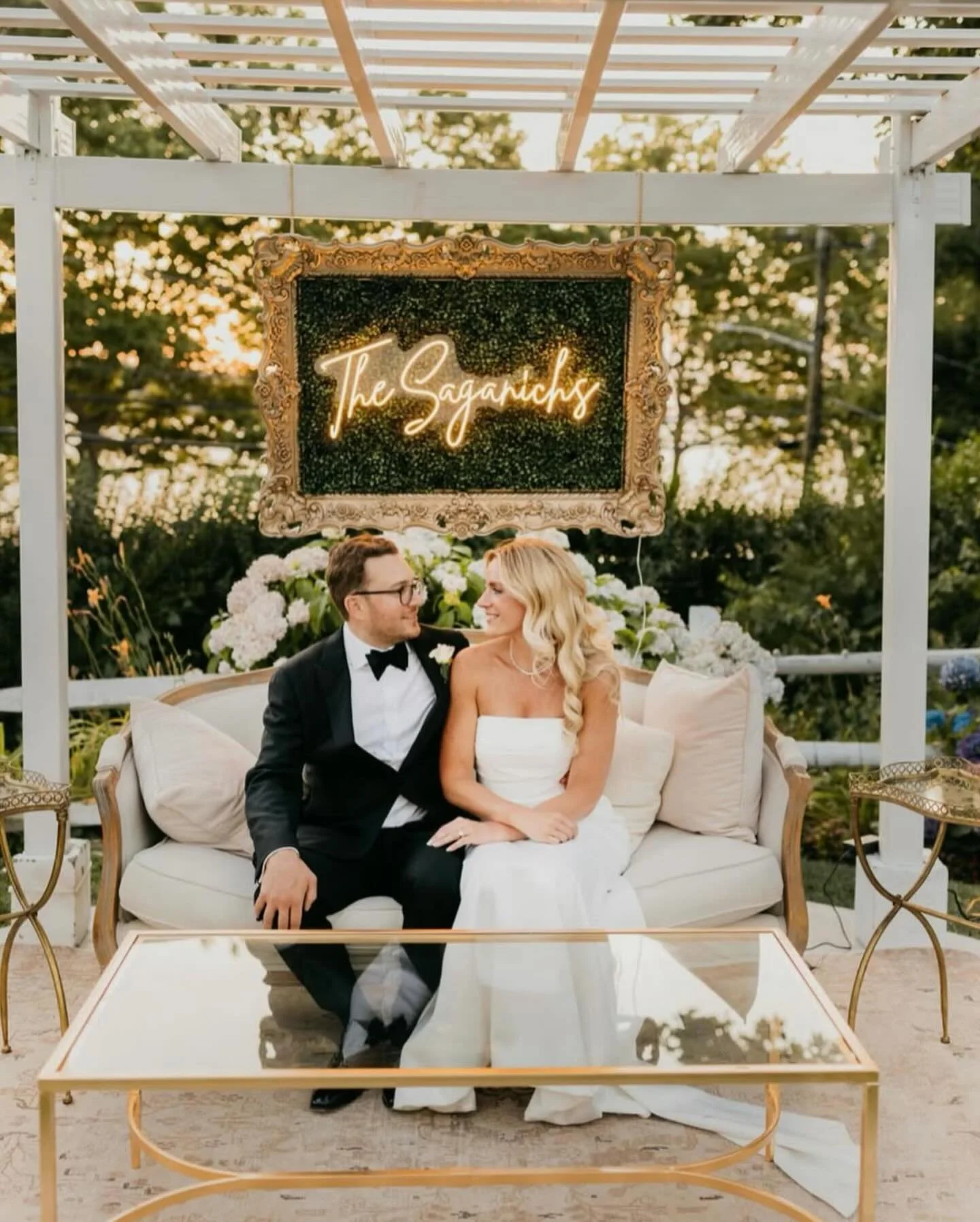 You can add any signage to our gold ornate boxwood frame!  @_vintageroots created this custom last name neon sign for our clients.  Think we might order a &lsquo;Cheers!&rsquo; One for ourselves 🥂📷:@lumosweddingphoto 

Featuring:
-Gold ornate boxwo