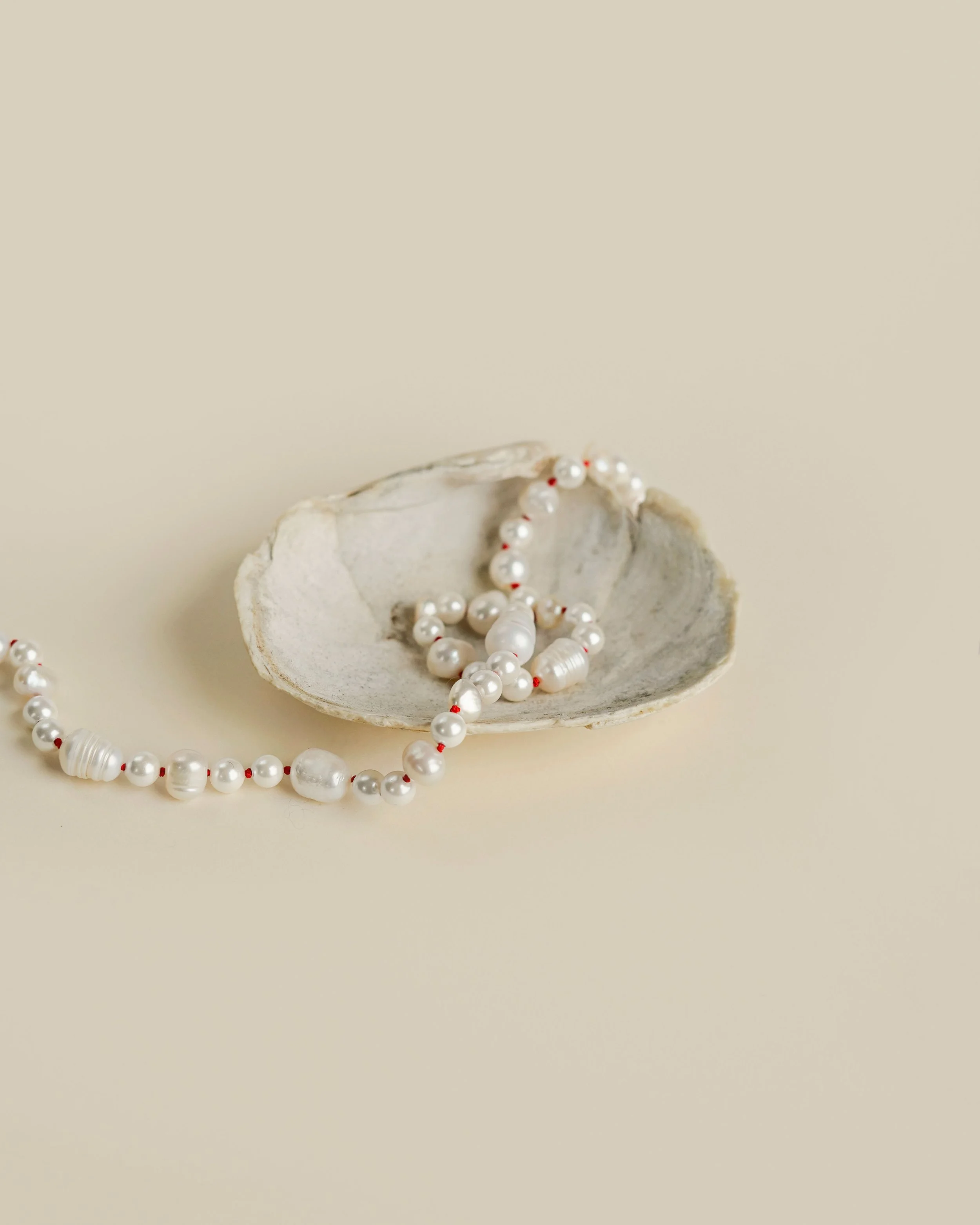 Nodo_knotted_pearl_necklace_blk.jpg