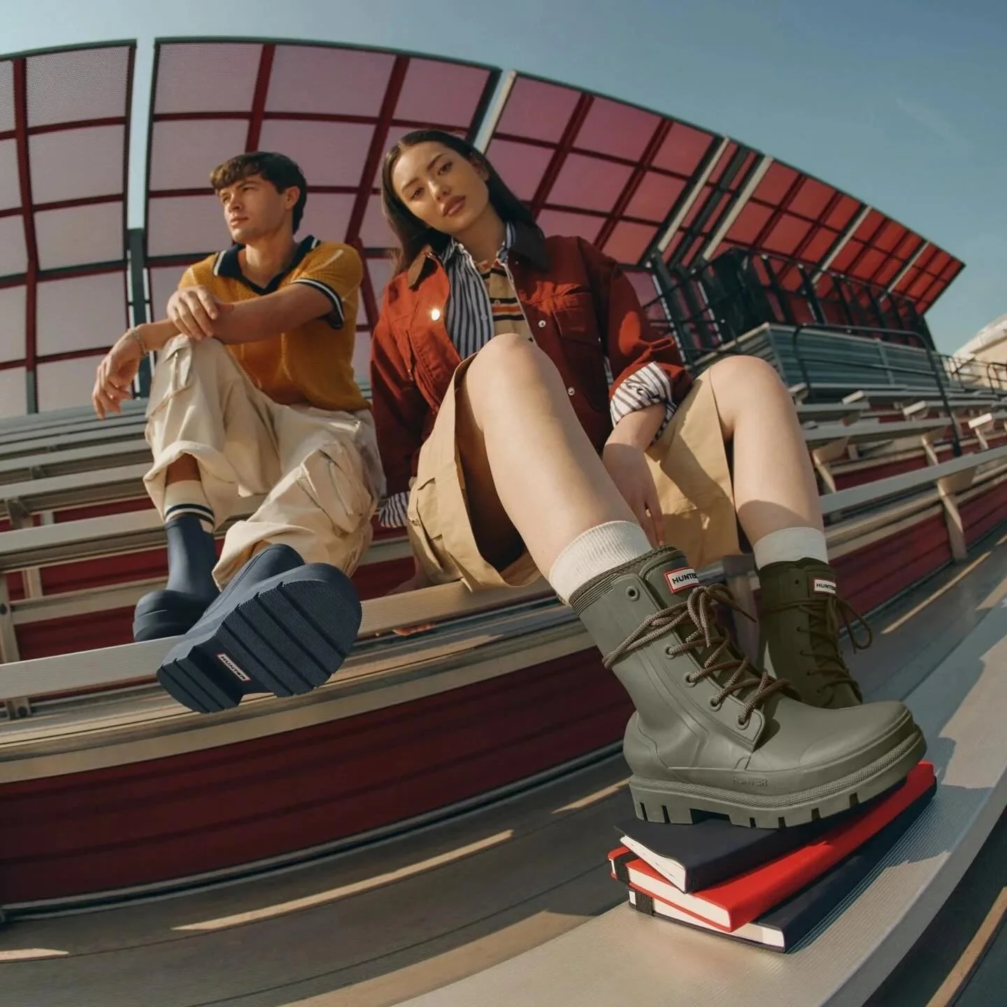 Hunter Fall 2025 (1/2). Creative directed the Back to School campaign with a large cast that included children. Carried the wide-angle lens through from spring, this time taking the shoot to stadium stands and handball courts to channel the energy of