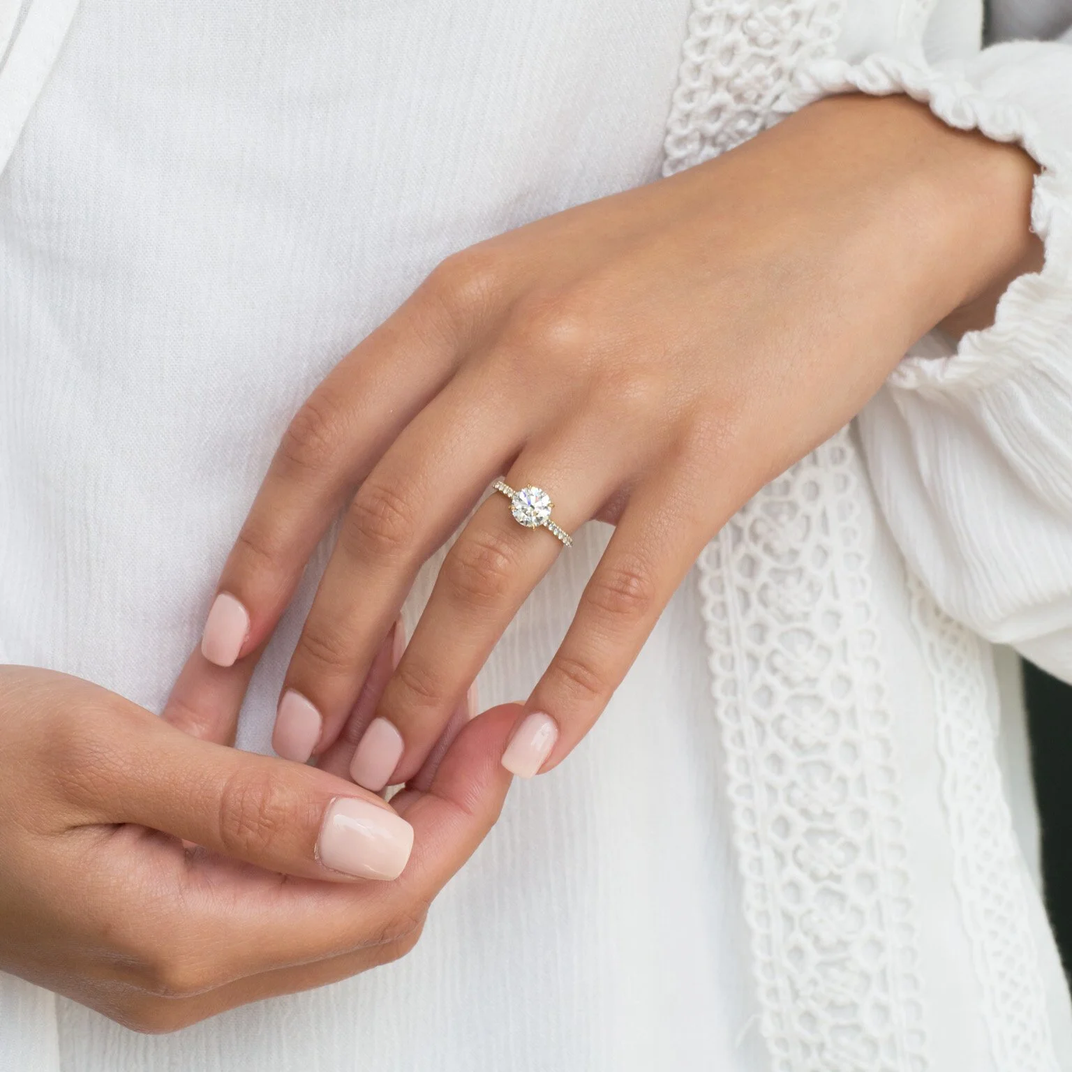 fine_jewelry_photography_white_gold_diamond_engagement_ring_hand_model.jpeg