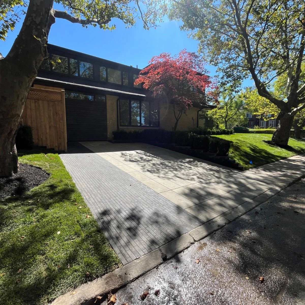 Seamless entry

This project completely upgraded curb appeal while improving the functionality of the home&rsquo;s exterior.

High-quality materials and expert craftsmanship were used to create a polished driveway, entrance and access around the side