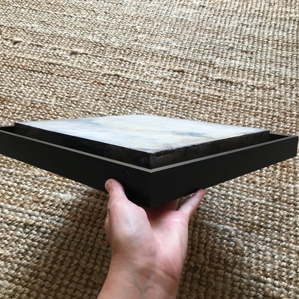 birch panel stands taller than frame