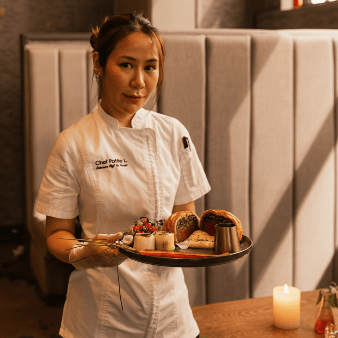 chef pattie holding her beef wellington at snap thai