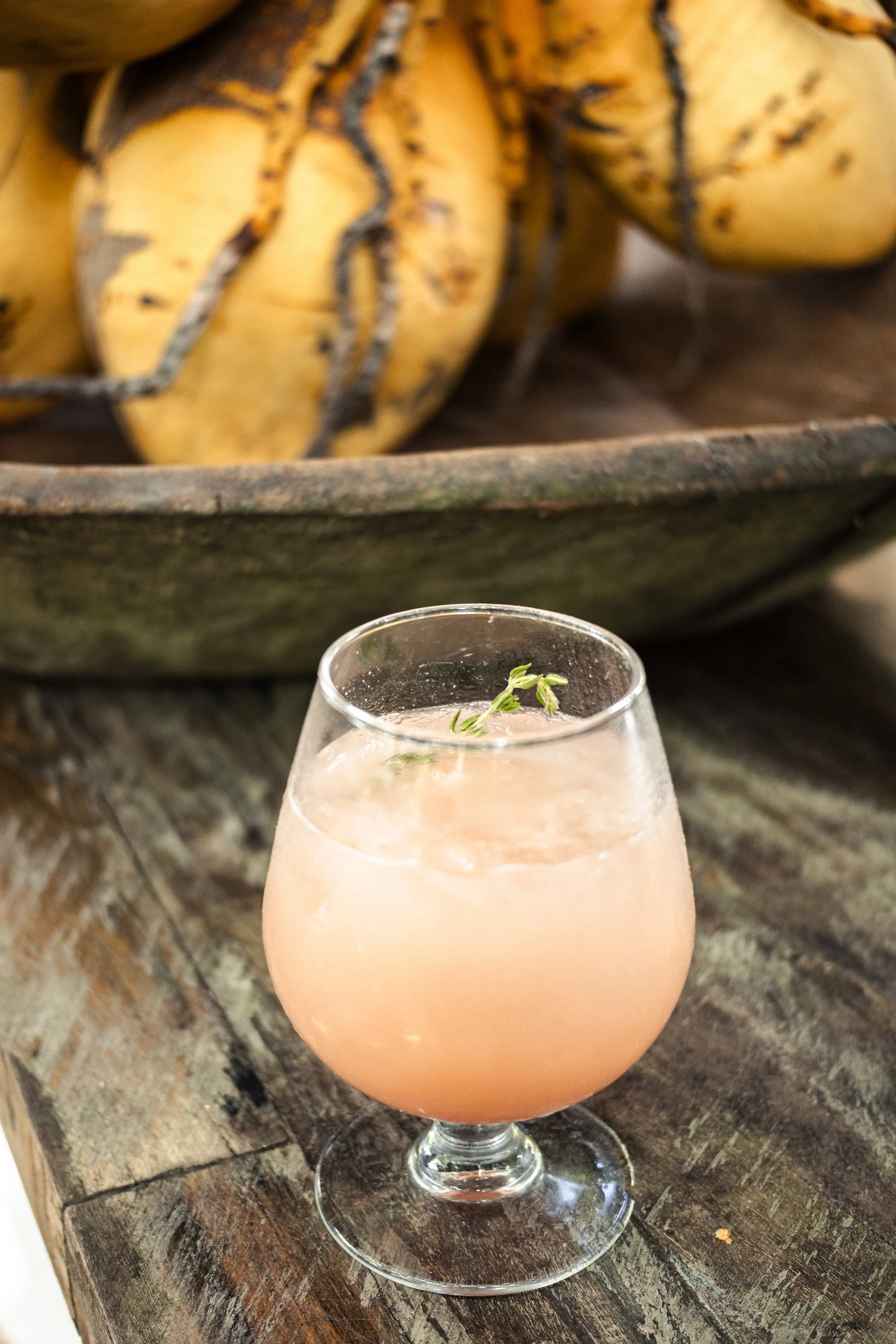 pink drink in water glass