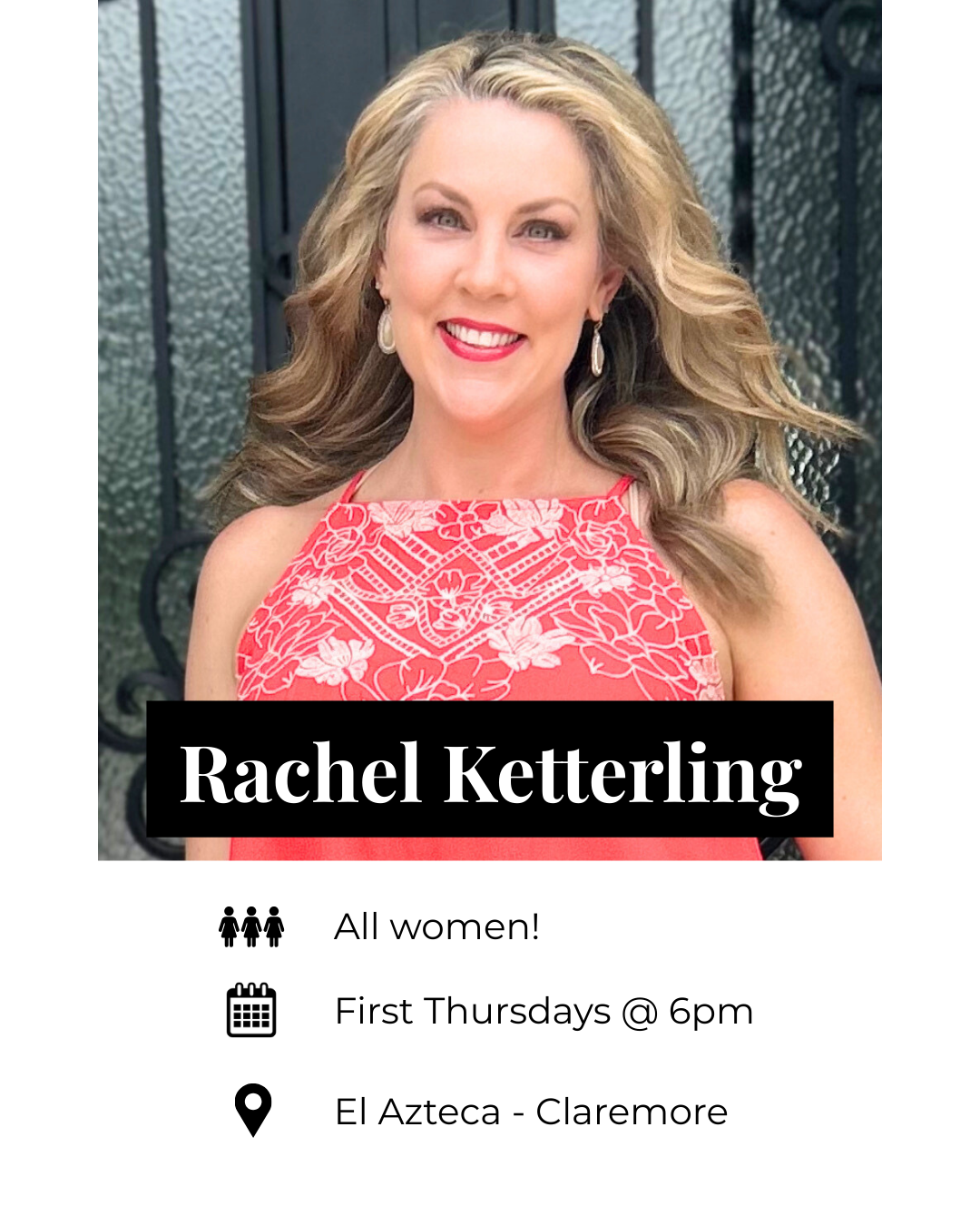 A smiling woman with wavy blonde hair, wearing a red dress with white floral patterns, earrings, and red lipstick, standing outside in front of a black fence.