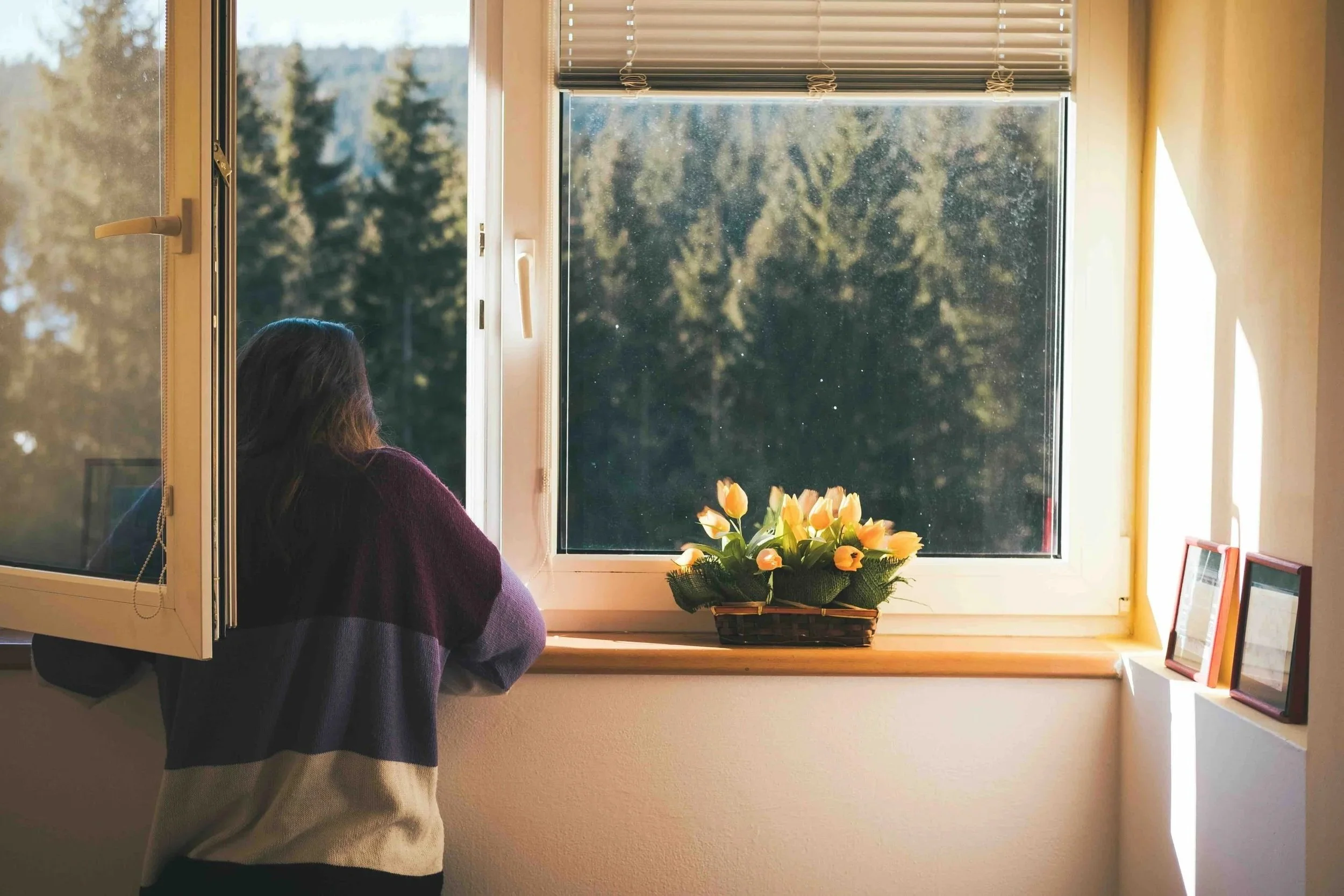 Woman looking out the window