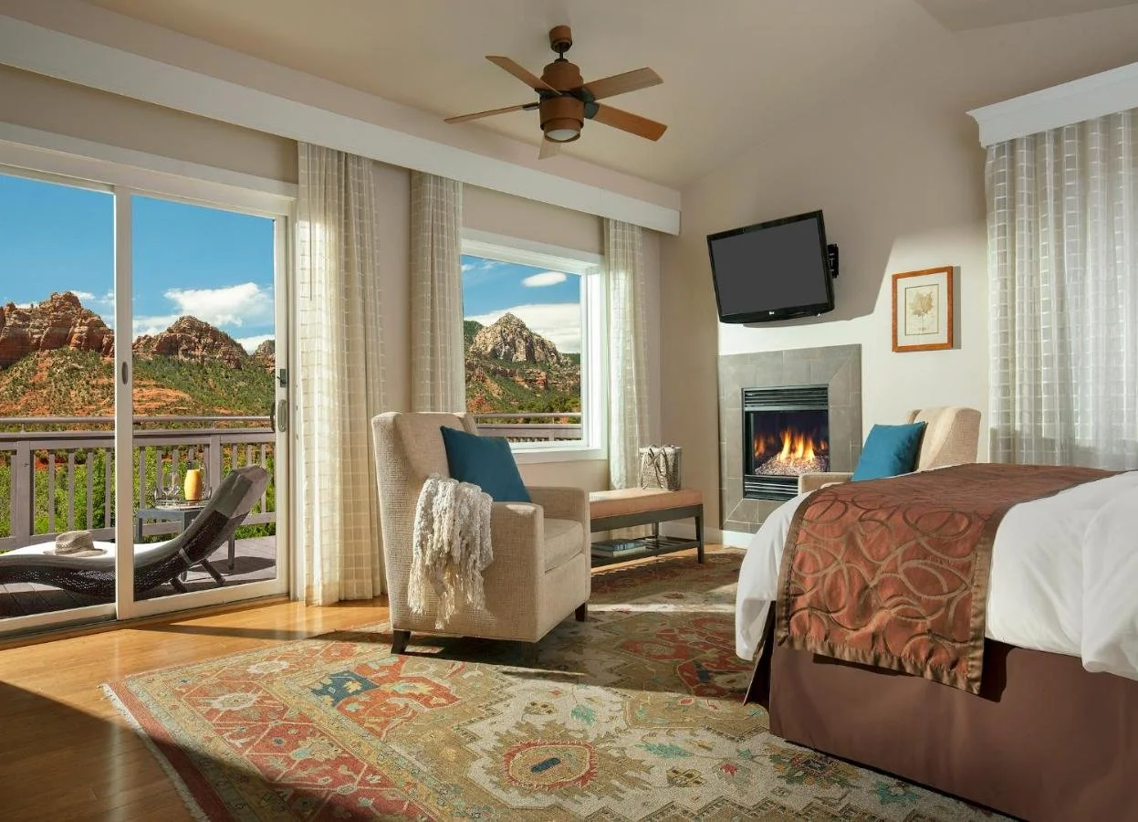 L'Auberge de Sedona romantic room with fireplace and balcony facing Snoopy Rock Giants Thumb and Elephant Rock