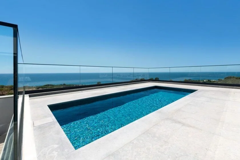 W Algarve Albufeira WOW suite rooftop plunge pool with glass railing and Atlantic Ocean panoramic view