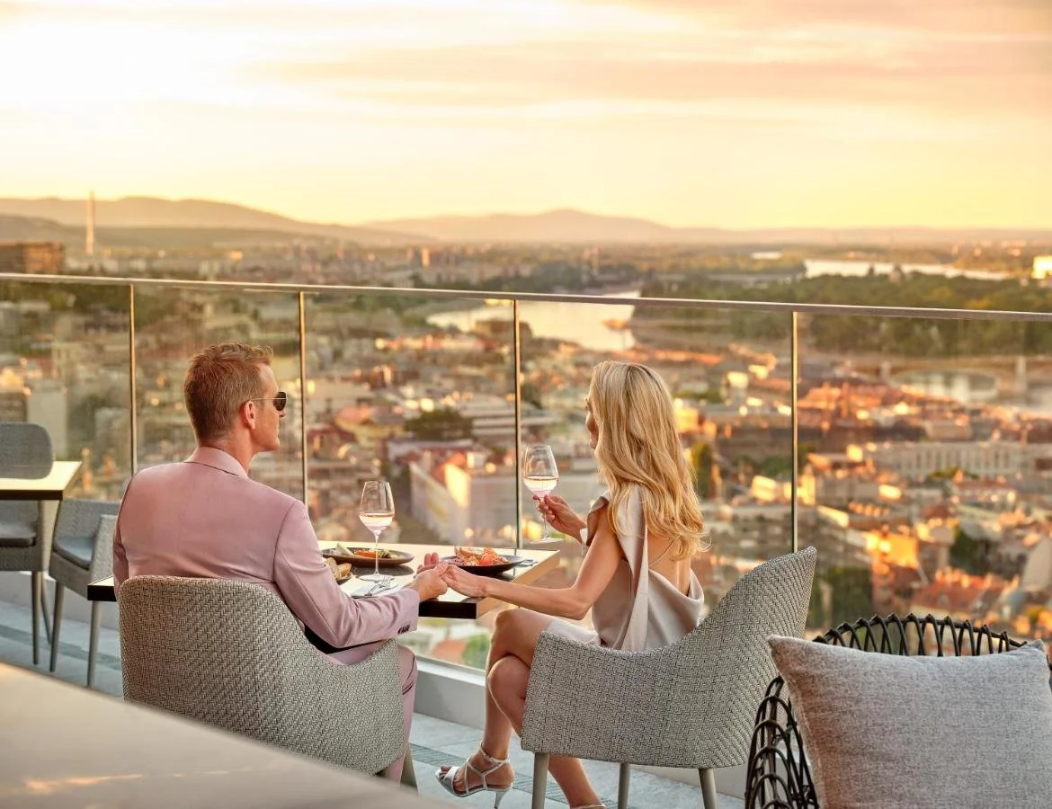 Hilton Budapest couple enjoys romantic meal with panoramic view
