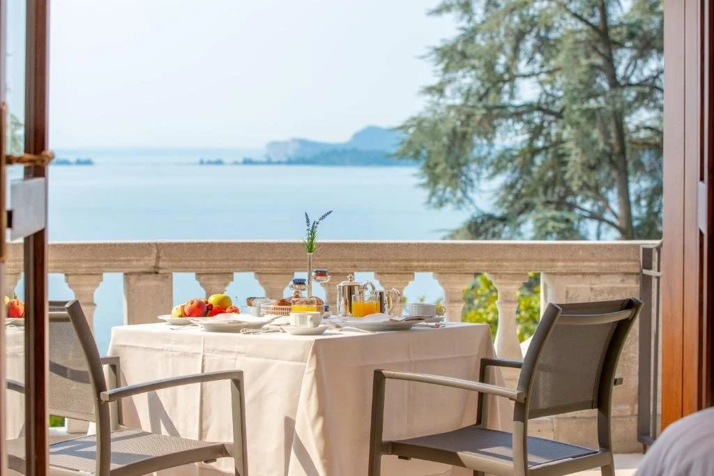 Hotel Villa del Sogno Gardone Riviera breakfast table with romantic lake view