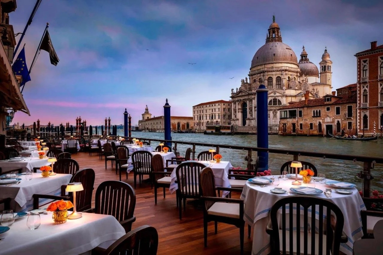 The Gritti Palace Venice terrace on the Grand Canal at sunset