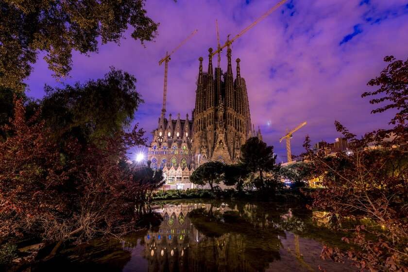 Barcelona's Sagrada Familia in a purple sky