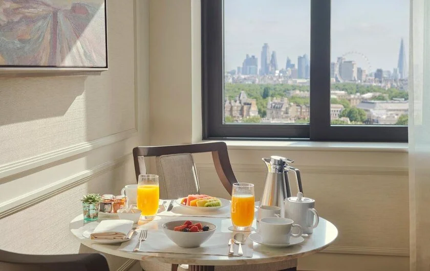 The Carlton Tower Jumeirah London in-room breakfast with skyline and London Eye view