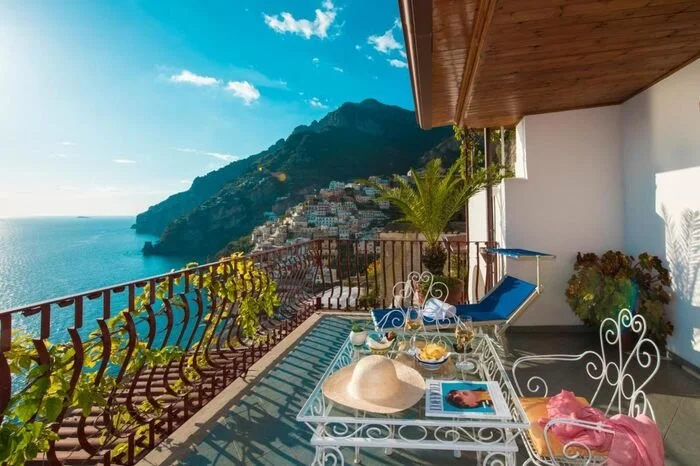 Hotel Eden Roc Suites panoramic balcony overlooking Positano and the Li Galli islands