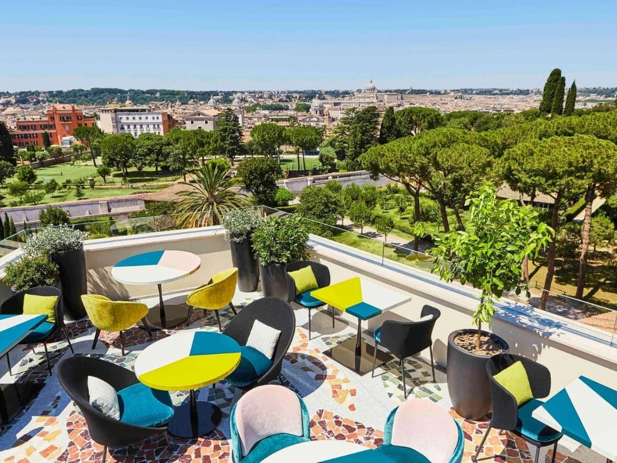 Sofitel Roma Villa Borghese Settimo terrace with Rome skyline and domes
