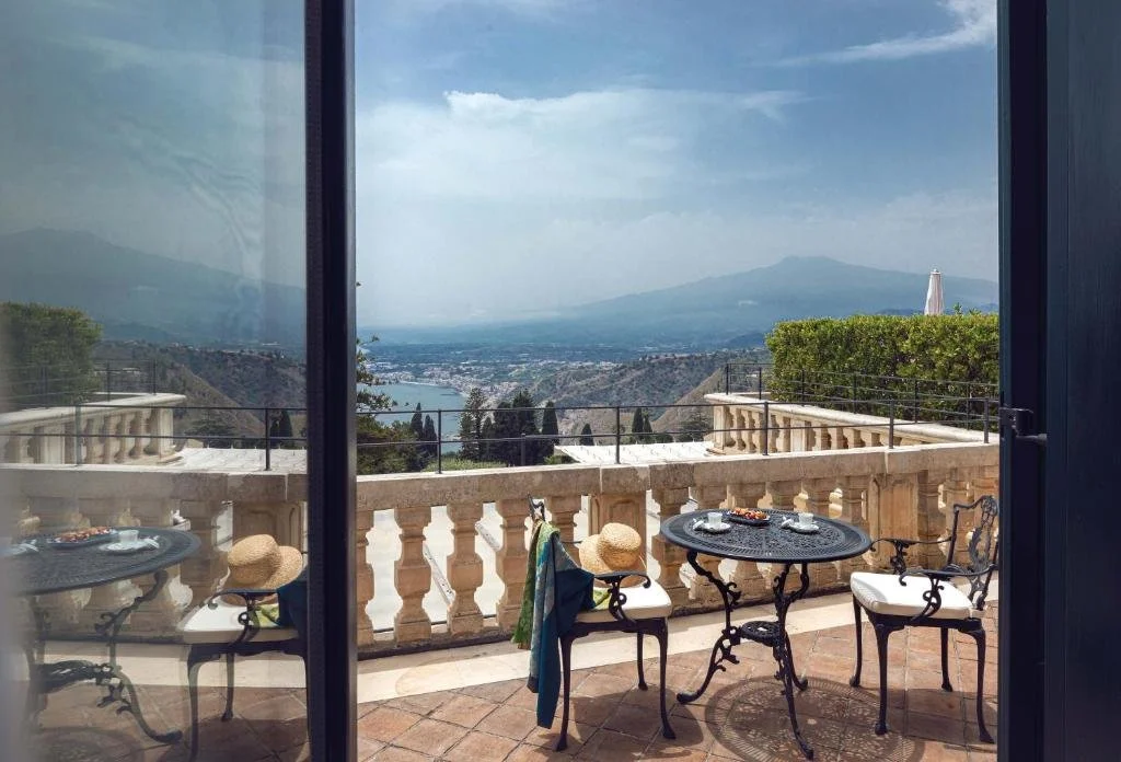 Grand Hotel Timeo Taormina stone terrace with Mount Etna and Bay of Giardini Naxos view