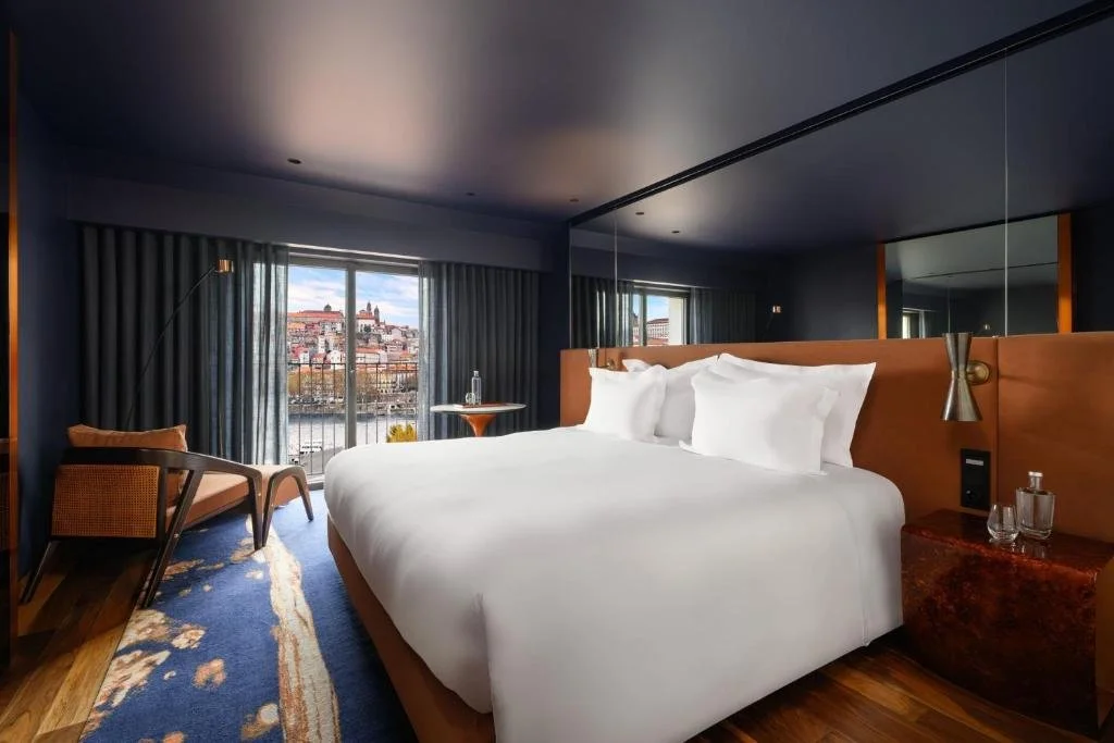 Forte de Gaia Autograph Collection Vila Nova de Gaia hotel room with window view of the Douro River and Porto Ribeira hillside