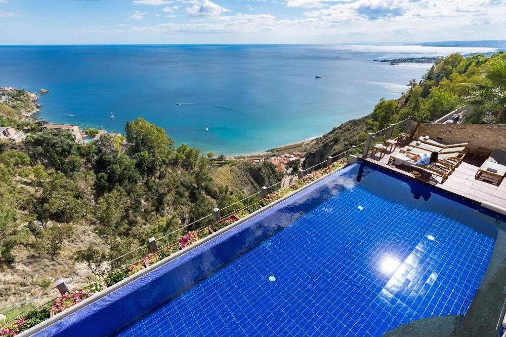 Hotel Metropole Taormina infinity pool overlooking Ionian Sea coast