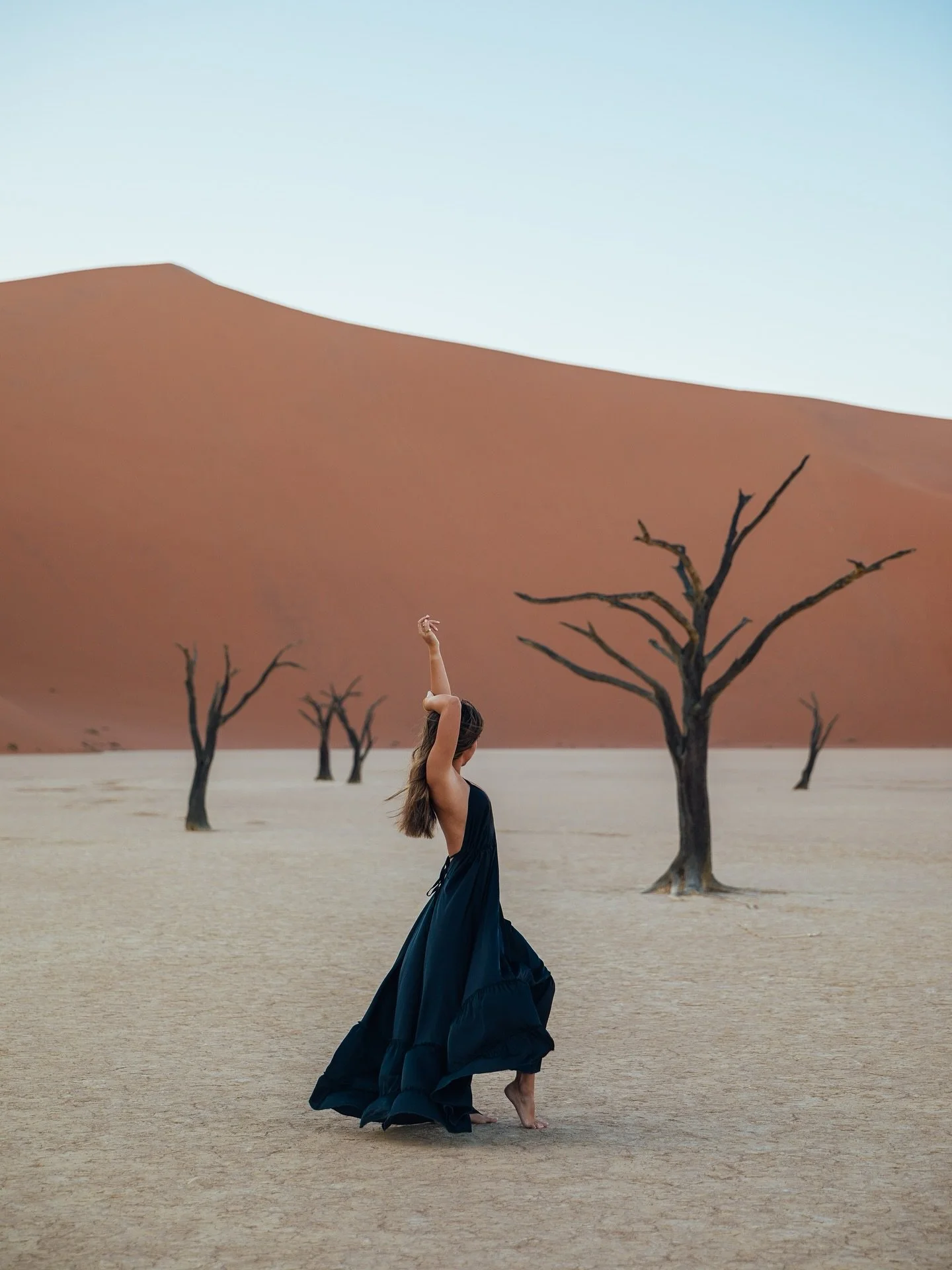 900 years without water has never looked better

deadvlei is one of the most surreal places i&rsquo;ve ever stood - ancient camelthorn trees frozen in time for 900 years, clay pan cracked beneath your feet, and towering red dunes that catch every sha