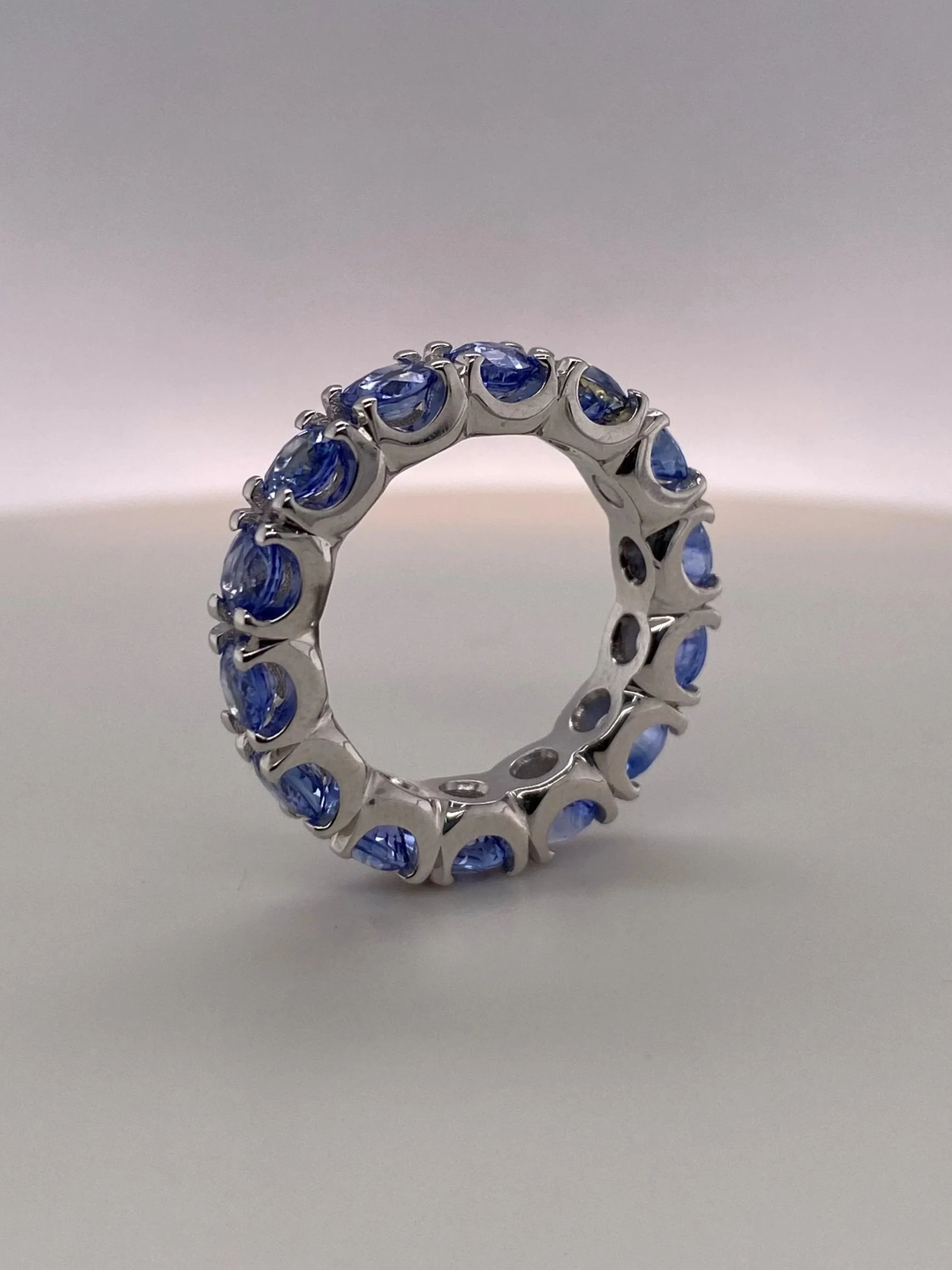 STG+Sapphire+eternity+ring.jpg