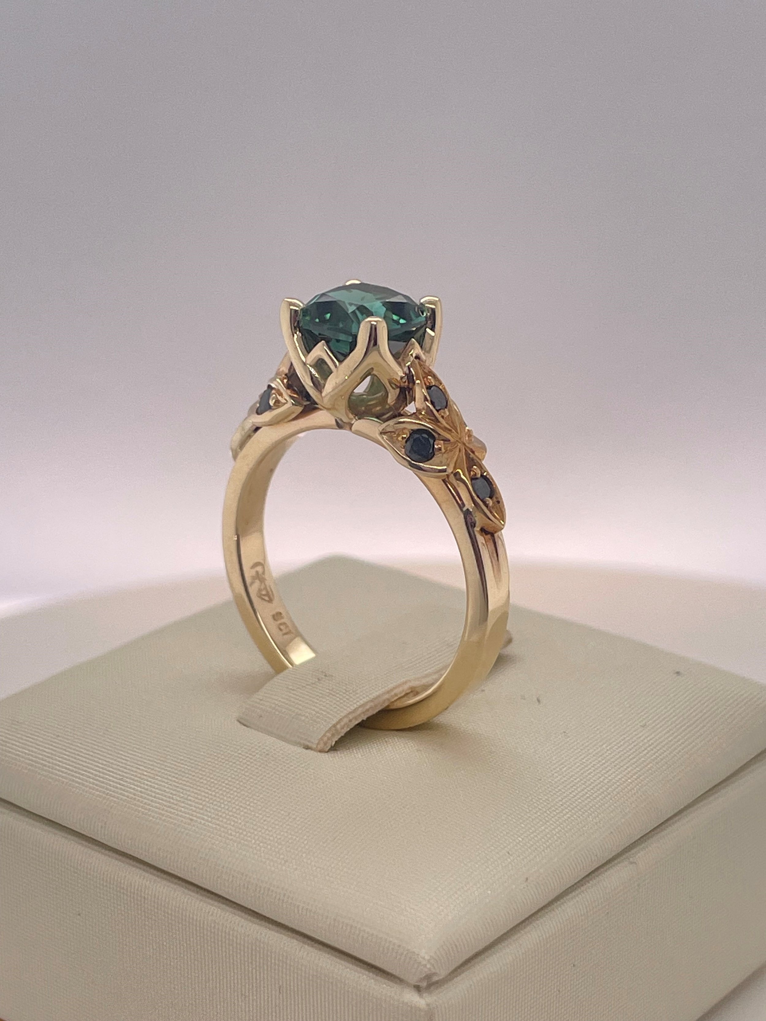 Green Tourmaline and black diamond ring.jpg