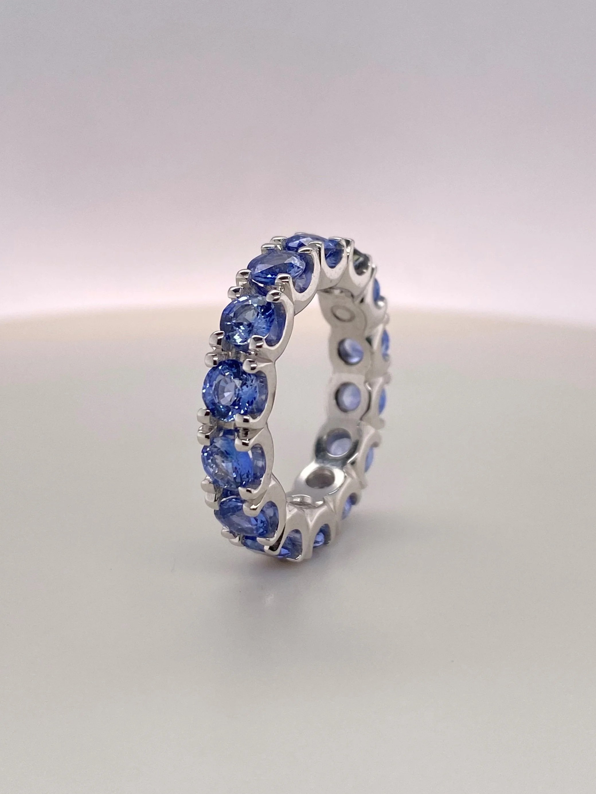 STG+Sapphire+eternity+ring+angled.jpg