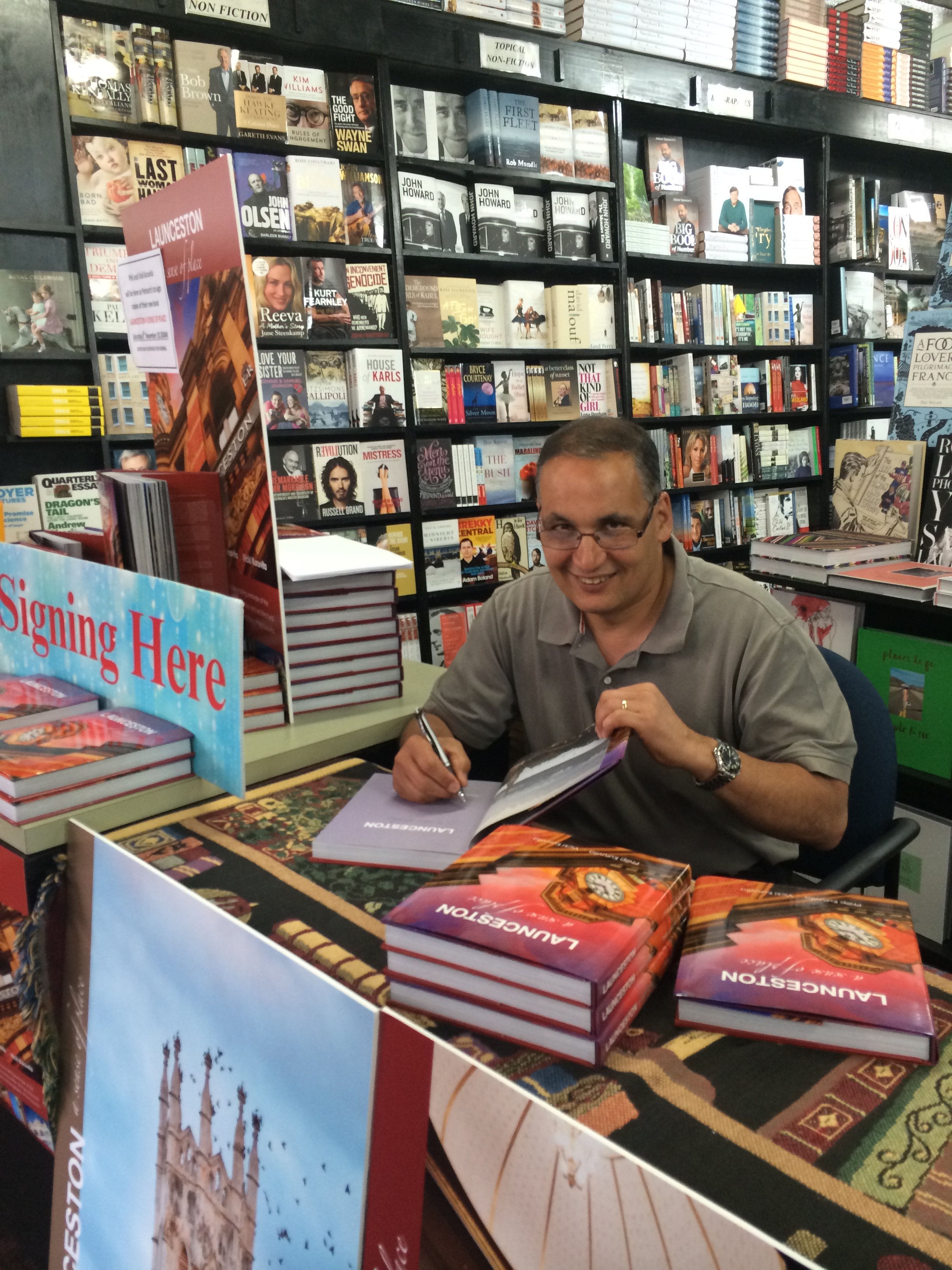 phil kuruvita, tasmanian photographer and knife maker author of 12 books on Tasmania, food, travel and architecture at a book signing