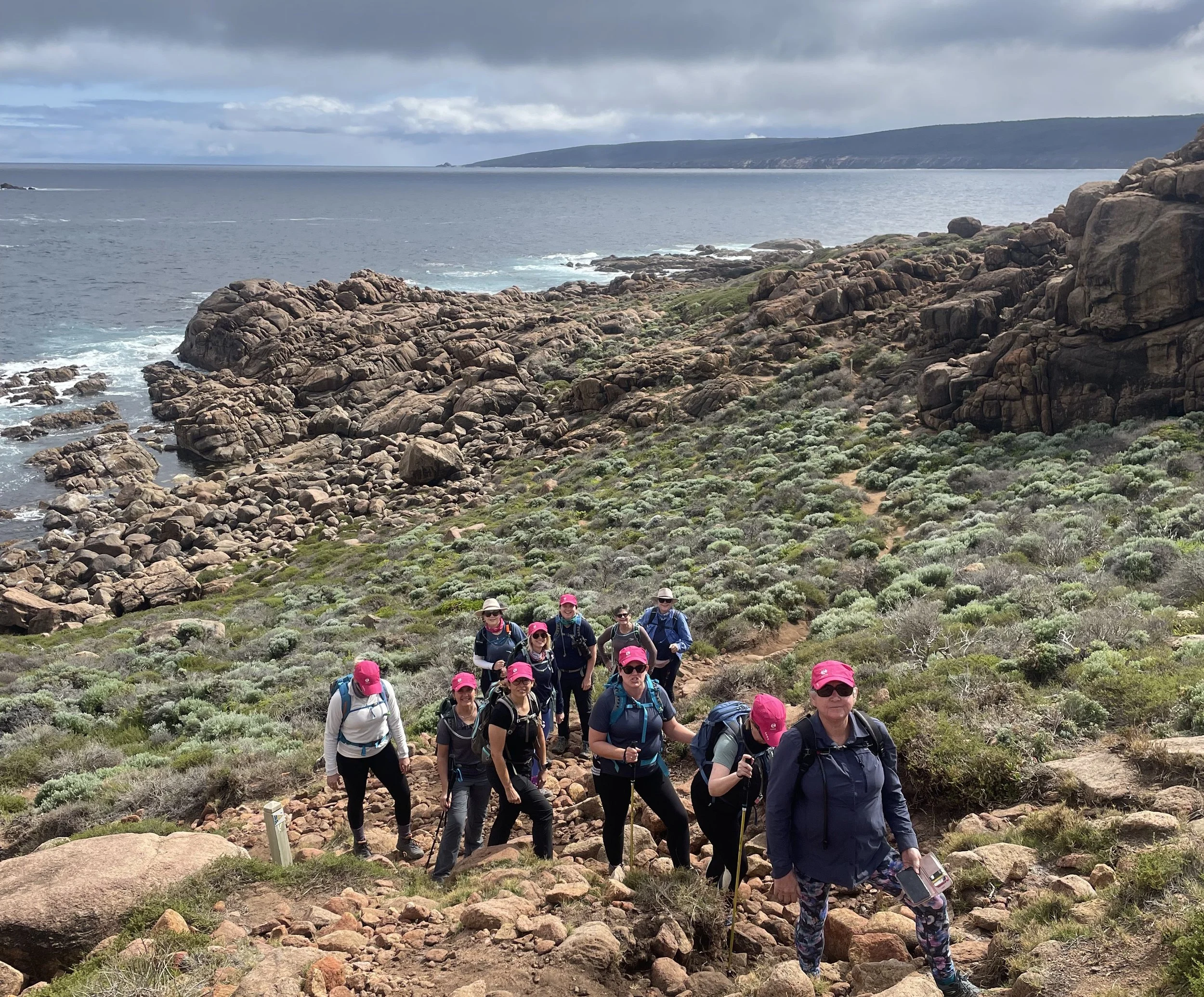 Women hiking the coastal path