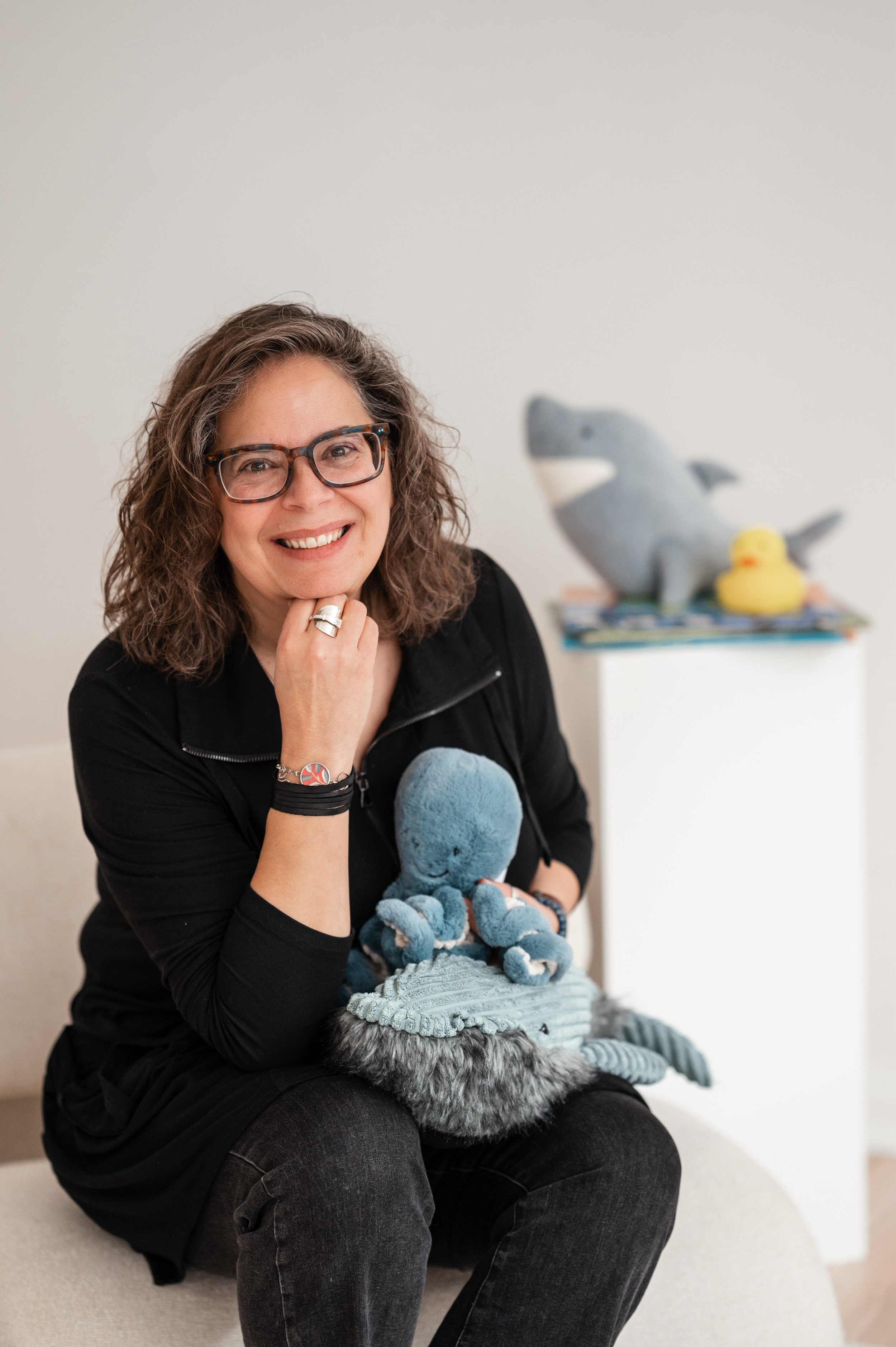 Image of Rochelle Strauss holding stuffies