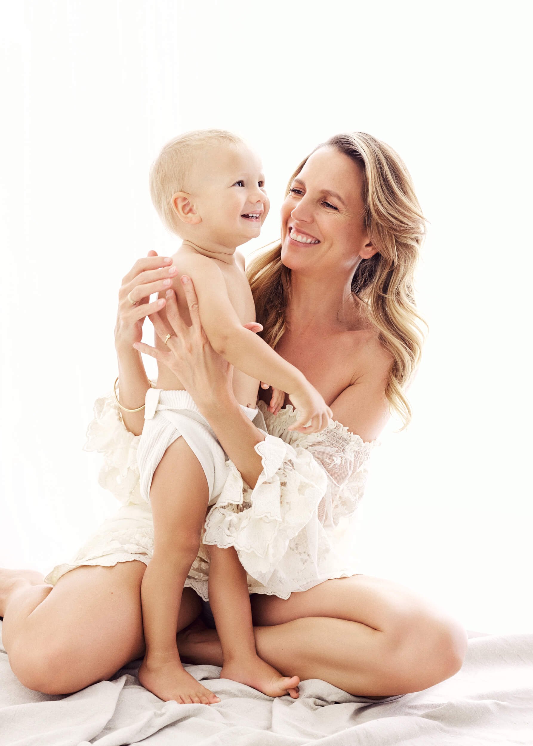 AmberMelodyPortraitStudio_1321_Mother and son backlit in studio.jpg