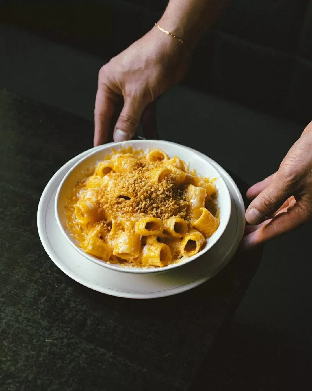 Golden comfort. An Angus &amp; Bon signature side dish. 
MAC &amp; CHEESE
Aged Irish cheddar, pangrattato