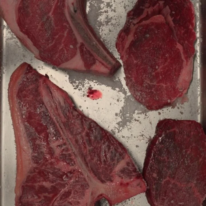 T-bone. Rostbiff. Eye of rump. Rib-eye.

Each cut its own character. 

Salt, smoke. Good beef needs very little. 

Sauce and sides take care of the rest. 

Angus &amp; Bon. Bon App&eacute;tit.