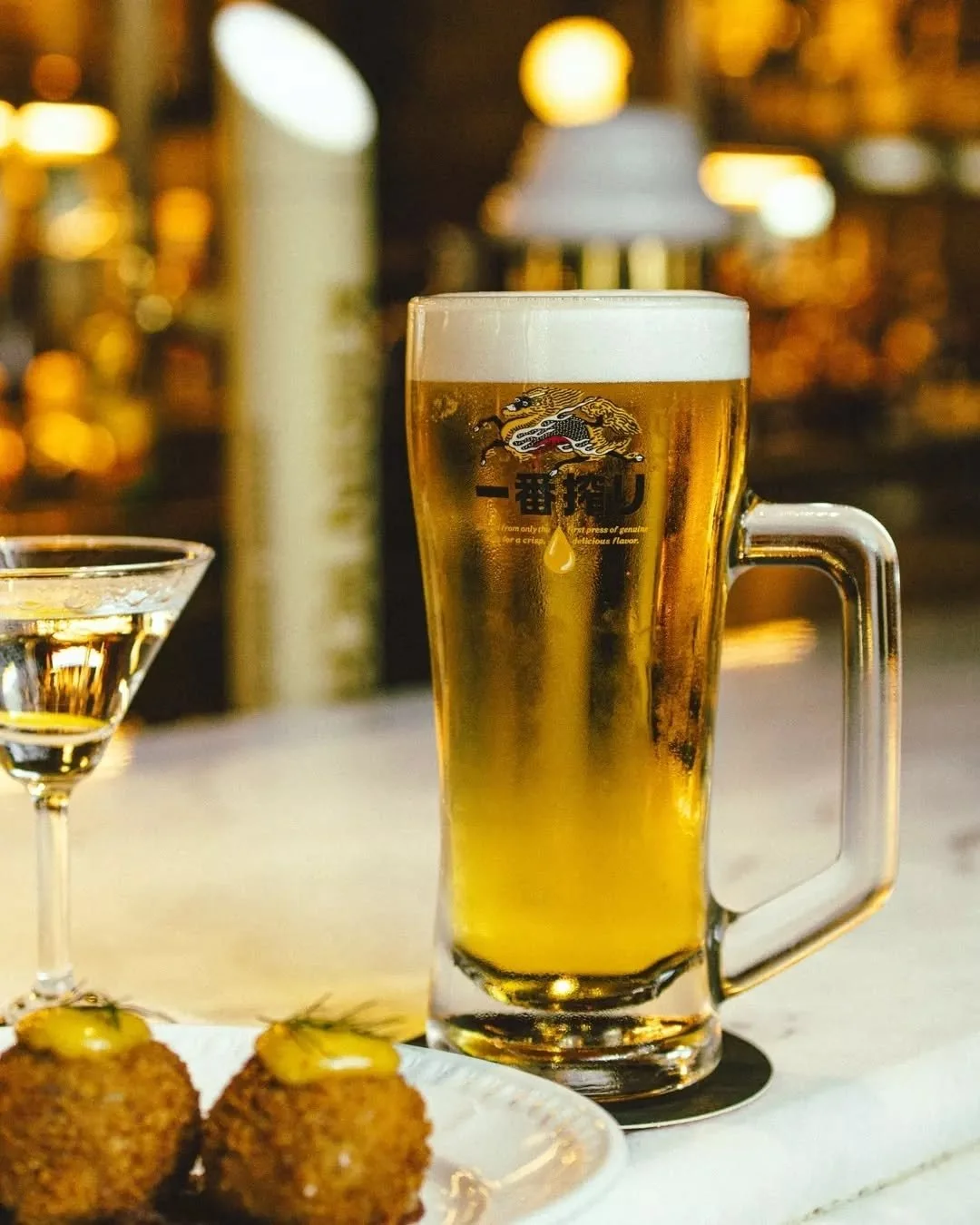 A Kirin on tap, poured with quiet precision. 

Our signature mini martini that appears before you've had time to think.

Served alongside a few small things from the kitchen. 

Olasagasti anchovy bruschetta with house focaccia, caramelised onion, oli