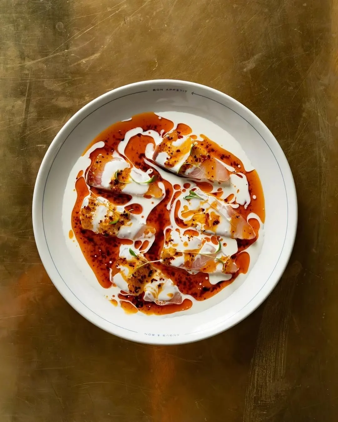 A dish of dualities. 

Raw kingfish, cured in citrus and kampot pepper.

Two sauces, buttermilk and salsa macha.

Mellow, but with a kick. 

Bon App&eacute;tit.