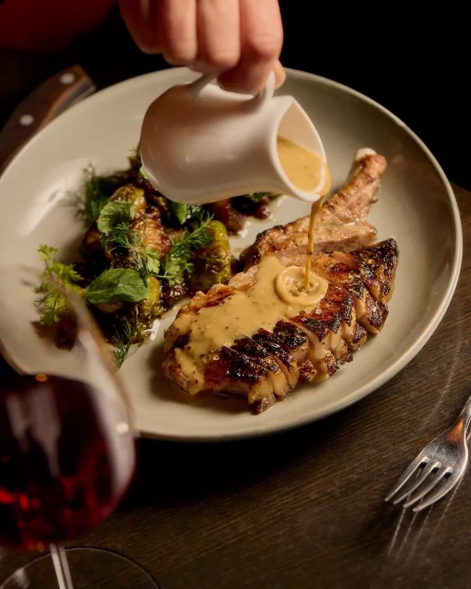 Otway pork rib chop, with Brussels sprouts, seeded mustard sauce, apple &amp; vincotto. 

Considered from grill to plate.