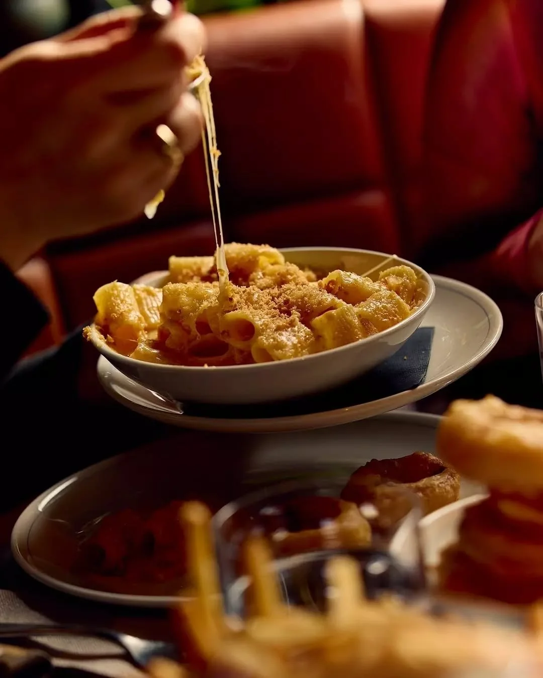 The first side to disappear from the table. 

Our famous Mac &amp; Cheese. With aged Irish cheddar, pangratatto.