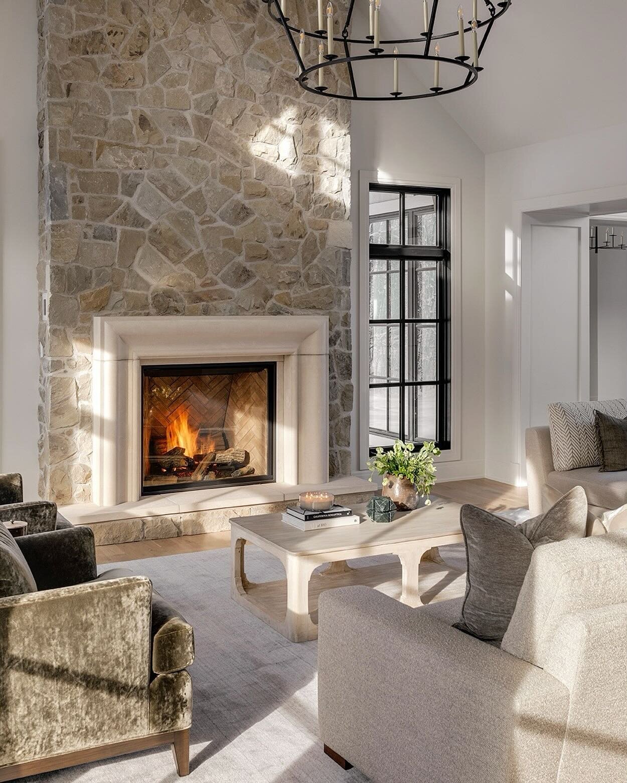 This living room and fireplace took my breath away. I would love to curl up in front of that fireplace right about now 😍 home by @verandaestatehomes &amp; furnishings by @theheathercompany
.
.
#CalgaryPhotographer #CalgaryInteriorPhotographer #Calga