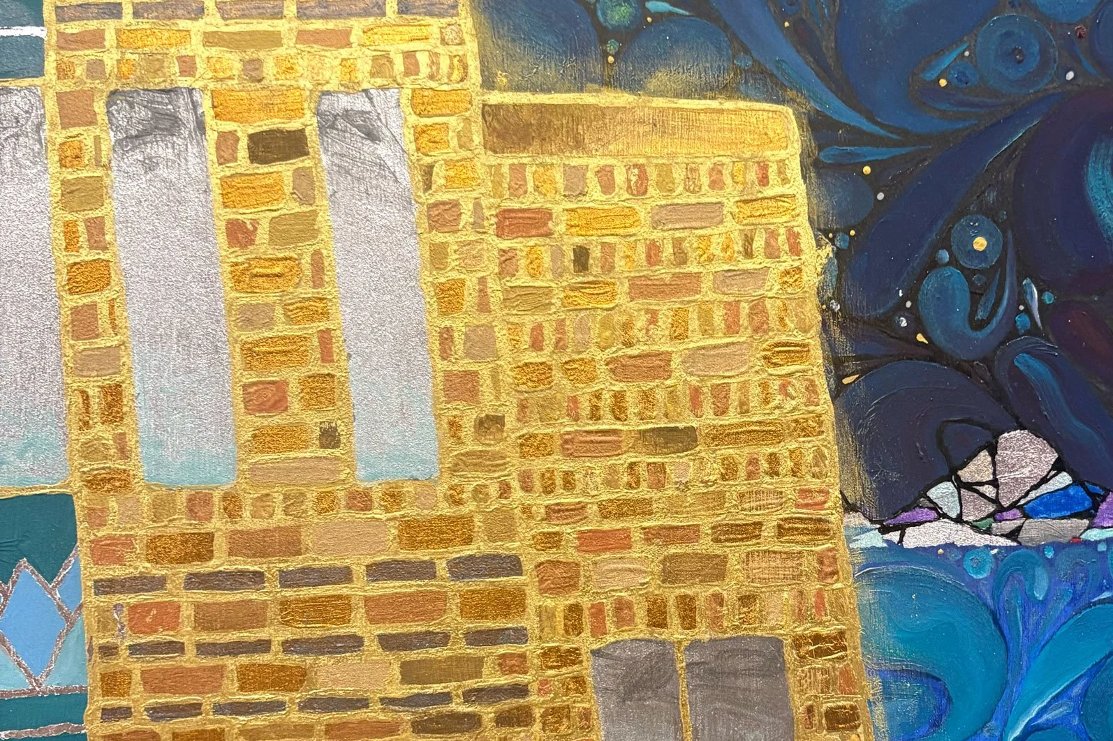 Close-up of a colorful abstract painting with gold, pink, blue, and purple hues, depicting a brick wall and swirling patterns.