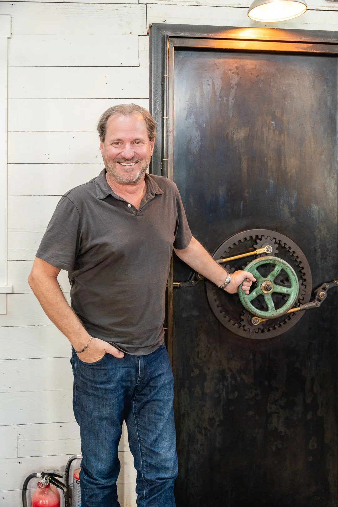 A man in front of a door at the Kirkland Cannery 
