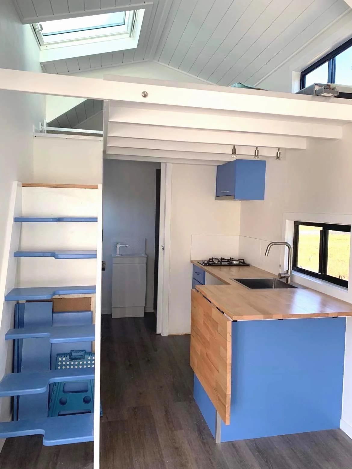 Kitchen and stairs Tiny home