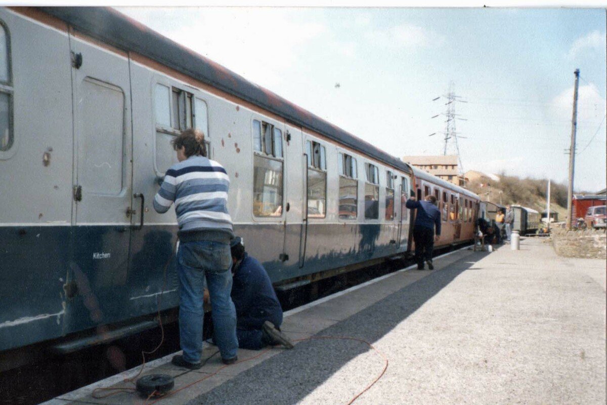 1933 (nearest the camera) is seen being sanded down for repainting in 1991. © P Witts