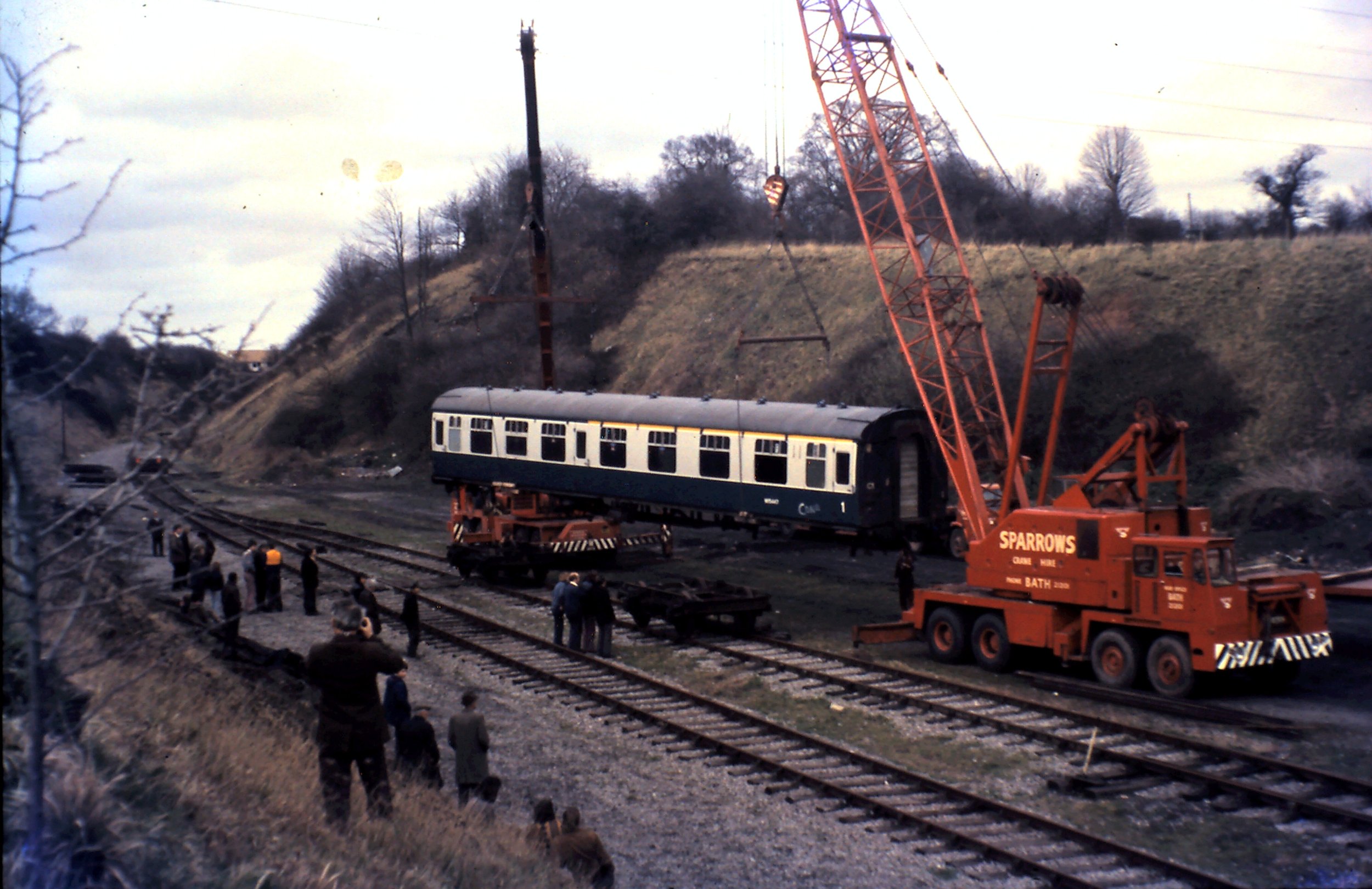 The body of 15447 is lowered onto its bogies.