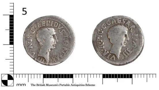 Two ancient Roman silver coins with profile busts of a Roman figure facing right, surrounded by Latin inscriptions.