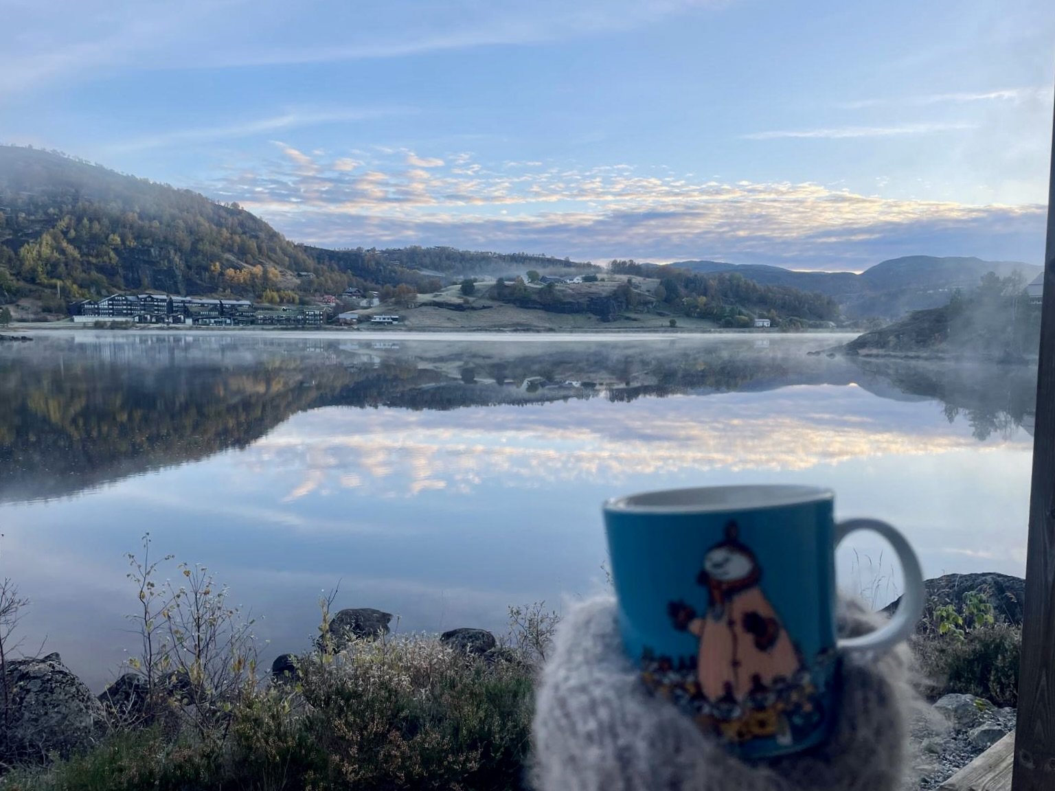 Quiet reflective moment in natural light, symbolizing simplicity, slowing down, and returning to self