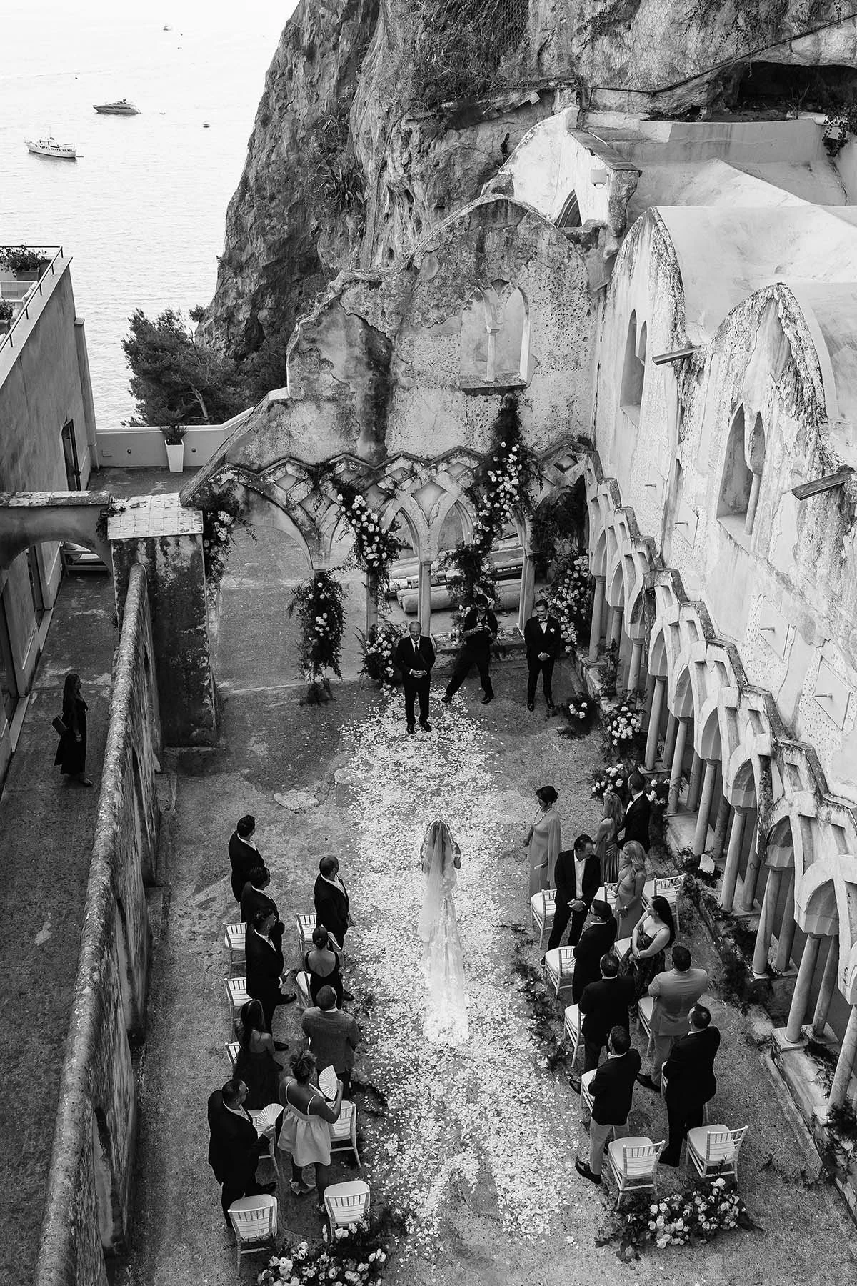 Aerial view of a ceremony at Hotel il Convento Anantara in Amalfi, Photo by Rellini art studio destination wedding photographer in Amalfi