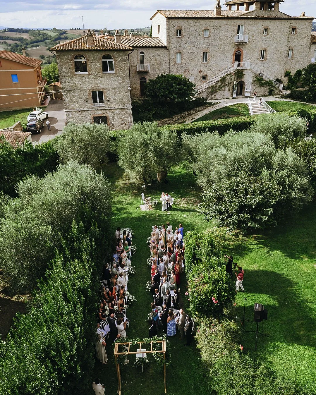 aerial view of a ceremony in the garden at Castello di Montignano