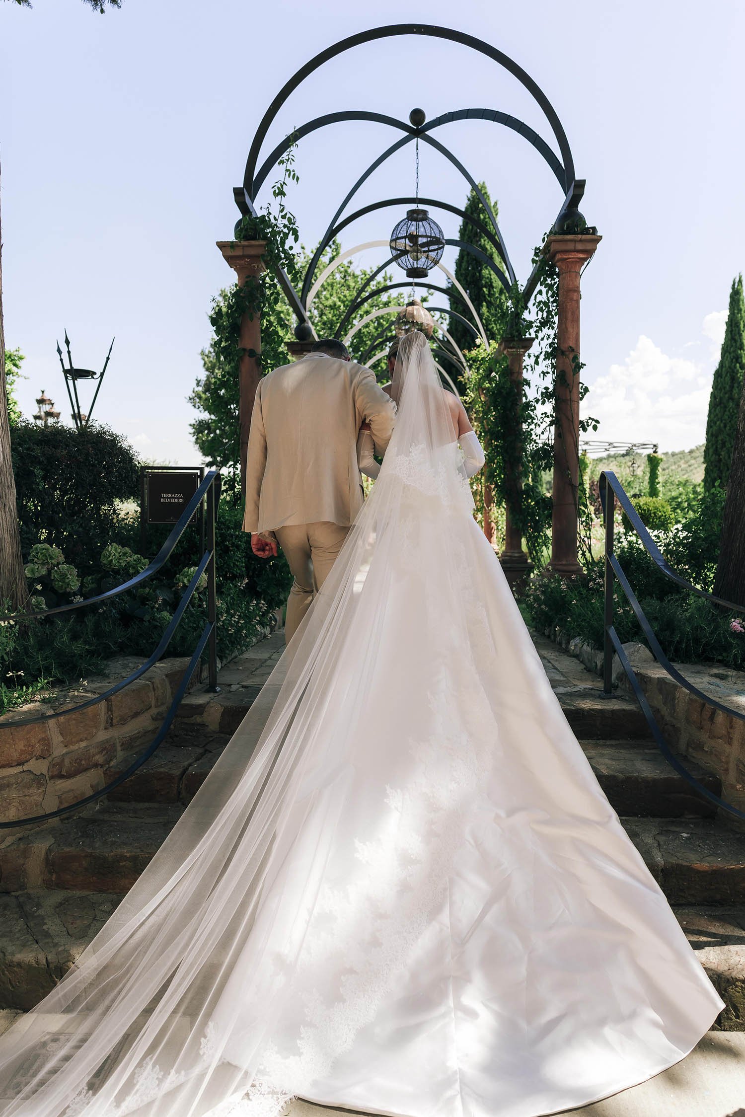 bride walking down the aisle with her father