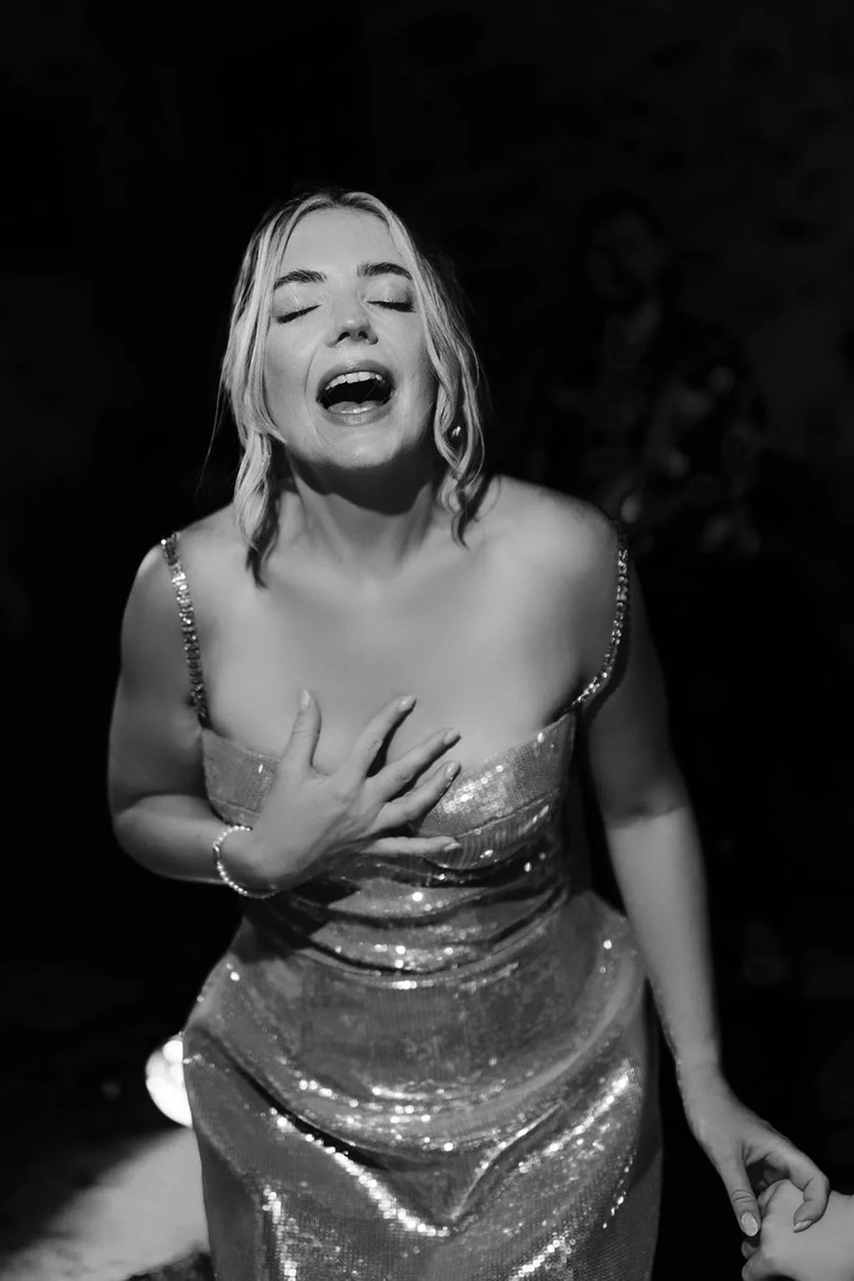bride singing during the wedding party