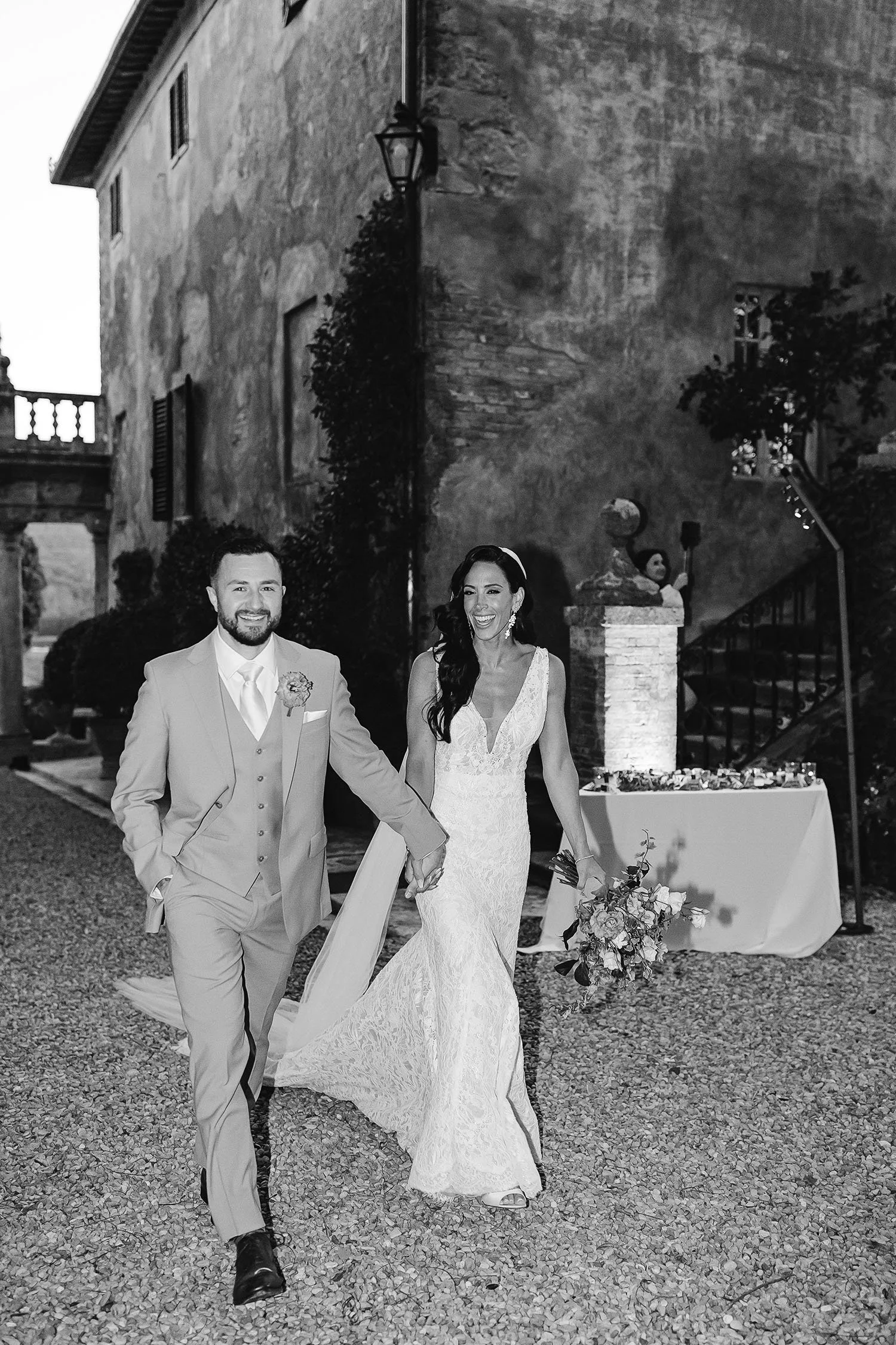 bride and groom walking to the dinner tables